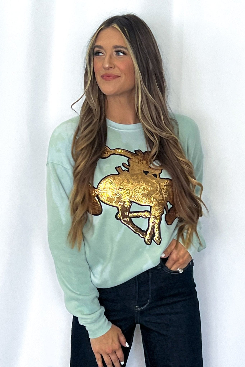 Crazy Consuela "Gold Sequin Horse" Bleached Western Sweatshirt — Bella + Canvas Aqua Sky Background with Cowboy Patch