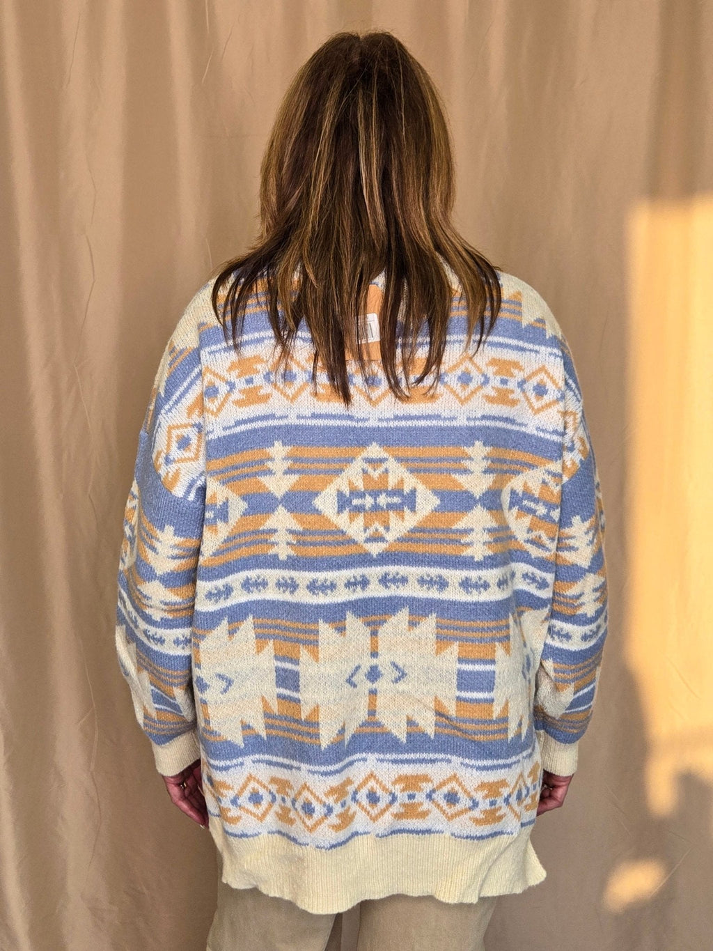 Main Strip Southwestern Knit Sweater — Oversized V-Neck with Bold Blue, Tan & Cream Print